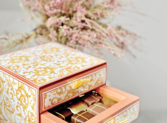 pink-box-filled-with-various-chocolate-pralines-in-2025-02-24-15-30-47-utc
